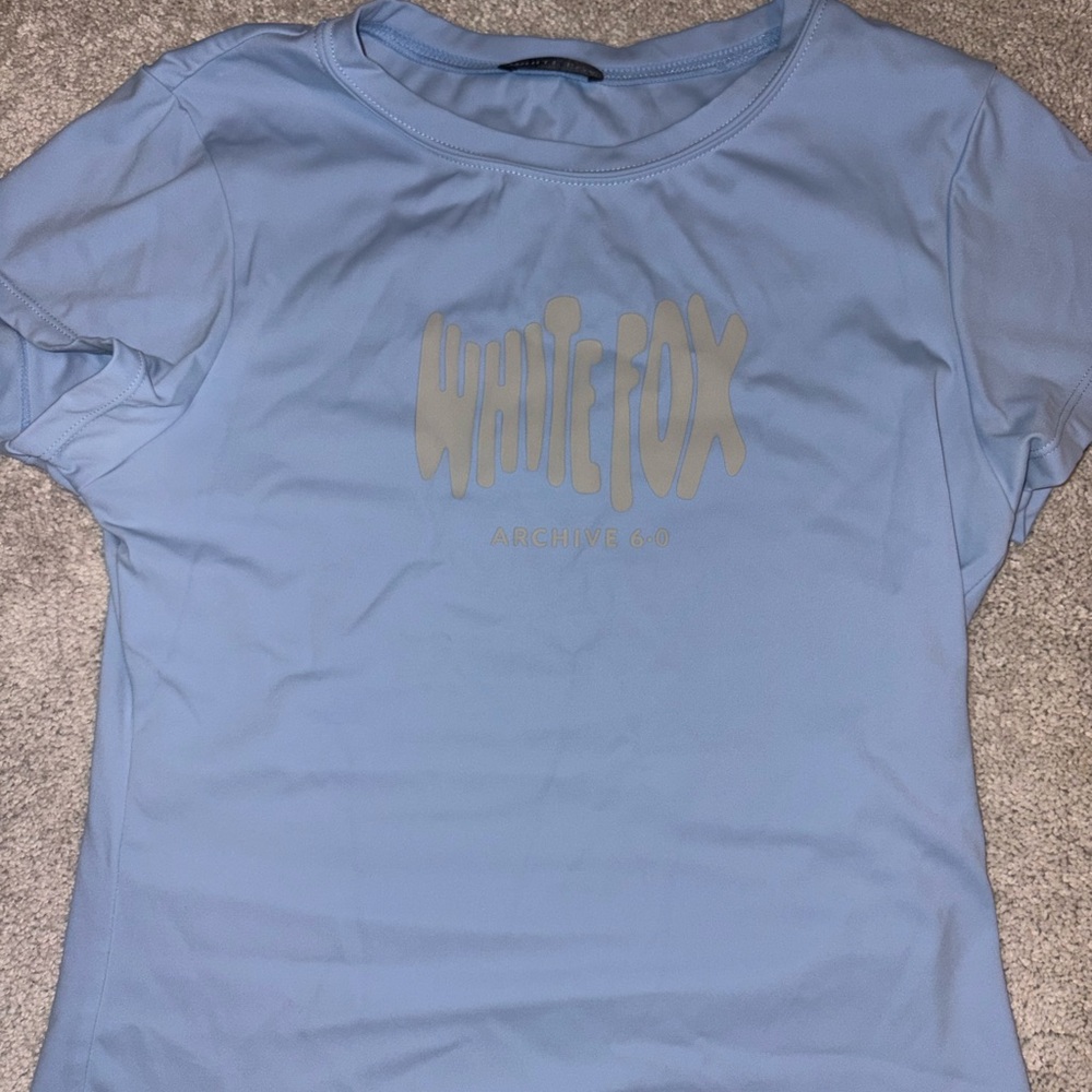 White Fox Boutique Light Blue Logo Short Sleeve Tee